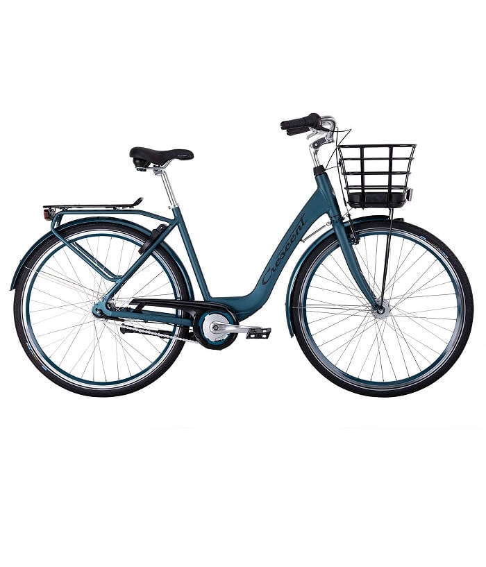 Tove-bla-7-vxl-2.jpg En elegant, turkos Crescent-cykel med korg fram och pakethållare bak. Bilden är tagen i studioljus med fokus på detaljer och cykelns klassiska design.