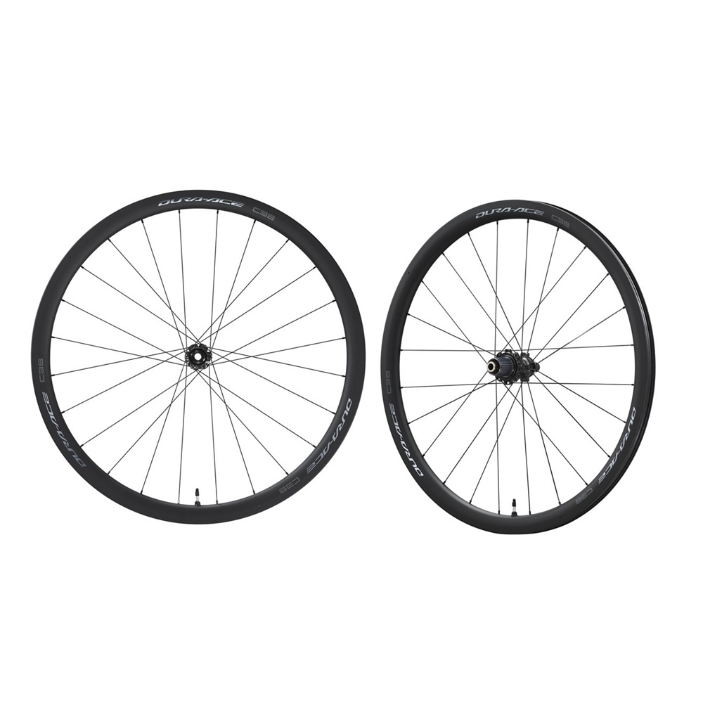 WH-R9270-C36-TL-P Två Dura-Ace WH-R9270-C36 hjul i kol, skivbromsmodell, fram och bak. Svart finish, skarpa detaljer i studiobelysning. Avsett för cykel.