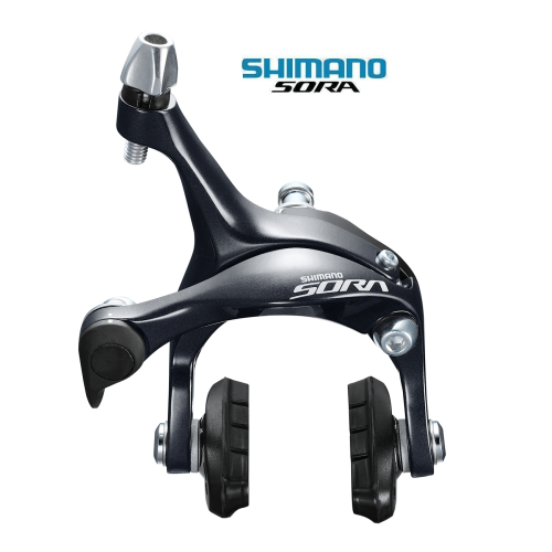 Shimano Sora BR-R3000 bromsdetalj i detalj. Mörk metallisk finish och starkt ljus framhäver den tekniska designen. Visar bromsbelägg och justeringsdetaljer för cykelbromssystemet.