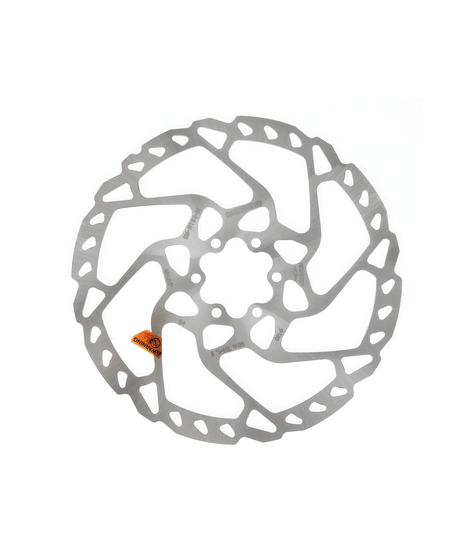 bromsskiva-rt66.png En metallisk Shimano SM-RT66 bromsskiva, med orange varningsetikett, presenteras i en ren, ljus atmosfär. Fokus ligger på detaljerna i dess utskurna design och den skarpa belysningen accentuerar dess silverfärg.