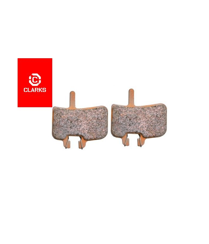 clarks-till-hayes-promax-sintrade.png Två skivbromsbelägg från Clarks för Hayes/Promax. Sintrade belägg med gråaktig yta och metallfästen. Clarks logotyp syns i rött ovanför. Neutral ljussättning, produktfotografering.