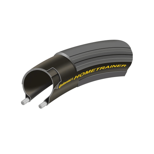 Continental Hometrainer däck, svart med detaljerad tvärsnittsvy som visar konstruktionen. Gult tryck av texten "Continental Hometrainer". Fokuserat ljus framhäver textur och material.