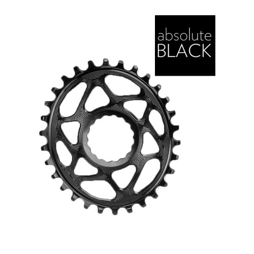 En detaljerad bild av AbsoluteBlack Rond Boost 3mm offset för Raceface, presenterad i en ljus studioatmosfär. Den svarta färgen framhävs av det kontrollerade ljuset.