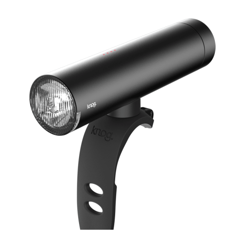 Framlampa Knog PWR Rider 450 lumen är en svart cylindrisk cykelstrålkastare med en klar lins, monterad på ett svart böjt fäste med två runda hål. Logotypen "knog" finns både på lampan och på fästet.