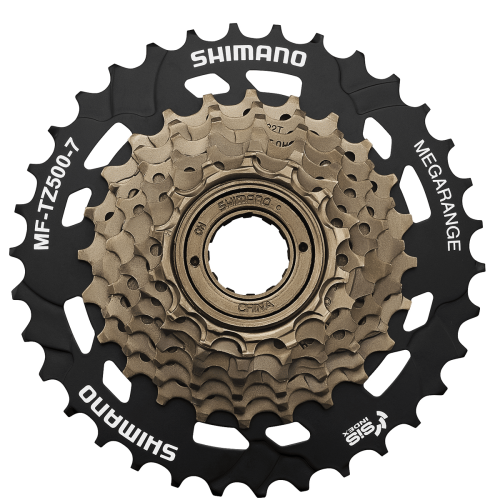 Närbild av ett Shimano MF-TZ500 7-växlat frikrans. Detaljerad bild med fokus på kuggar och text, inklusive "Shimano", "Megarange", och "MF-TZ500-7". Neutral belysning framhäver komponentens detaljer.