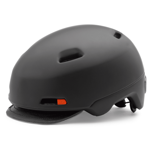 En mattsvart Hjälm Giro Sutton Mips-hjälm med flera ventilationshål, ett kort svart visir och en orange accent på sidan.
