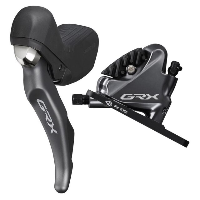 irx8104dlf6sc100.640 Shimano GRX ST-RX810 skivbromsset för landsvägscyklar, elegant presenterat i en studio med mjuk belysning. Fokus på detaljerna i reglagen och bromsoket, framhävda mot en ren bakgrund.