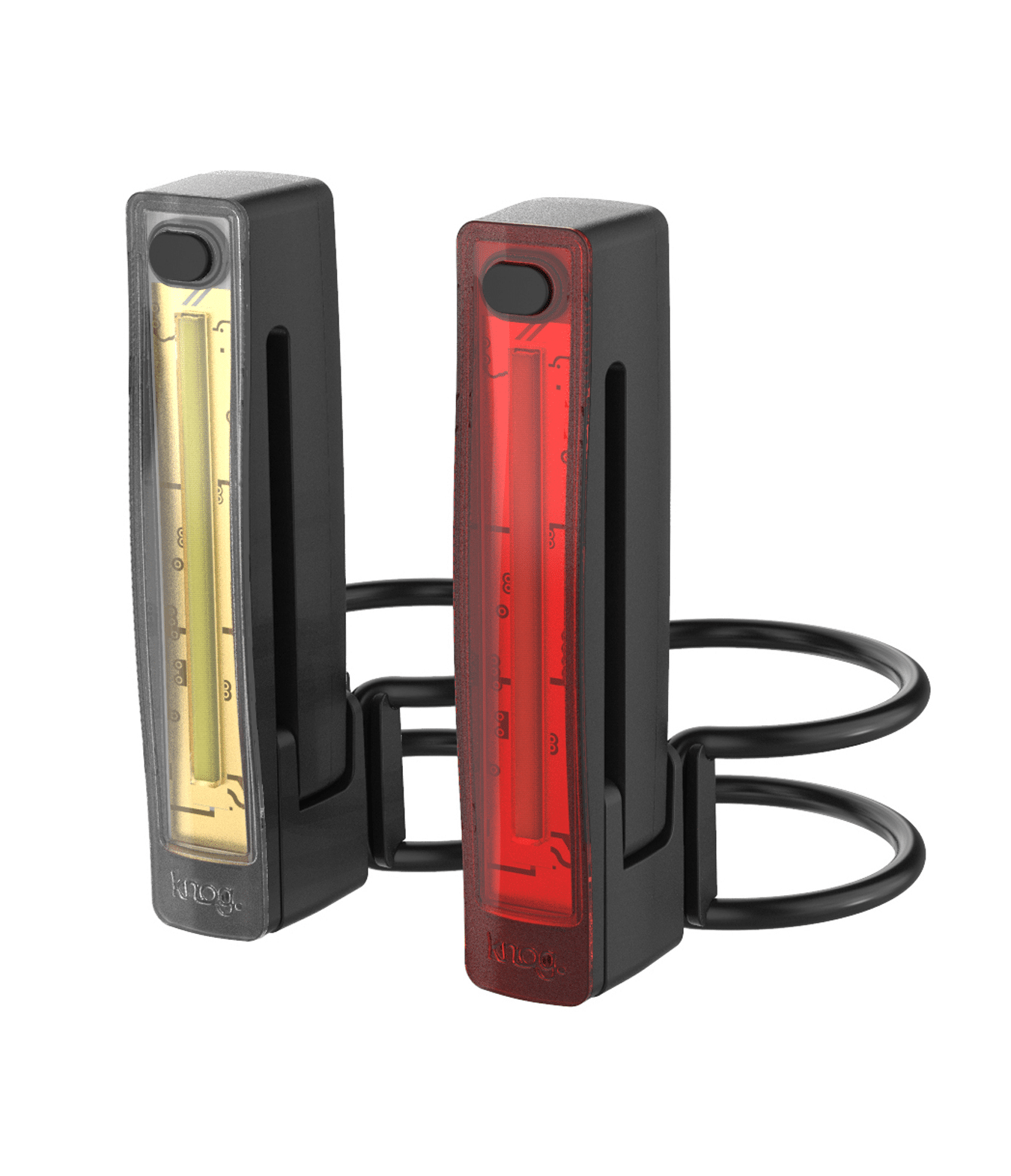 knog-lampset.png Belysningsset Knog Plus Twinpack belysningsset innehåller två rektangulära cykellampor - en gul fram och en röd bak - i svarta höljen med genomskinliga lock och elastiska monteringsband.