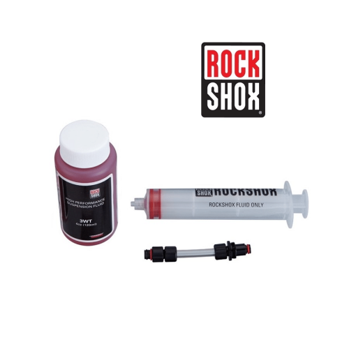 Produktbild för RockShox Charger luftningskit. En flaska röd hydraulolja, en genomskinlig spruta med RockShox-logga och en adapter visas i skarpt ljus mot en vit bakgrund.