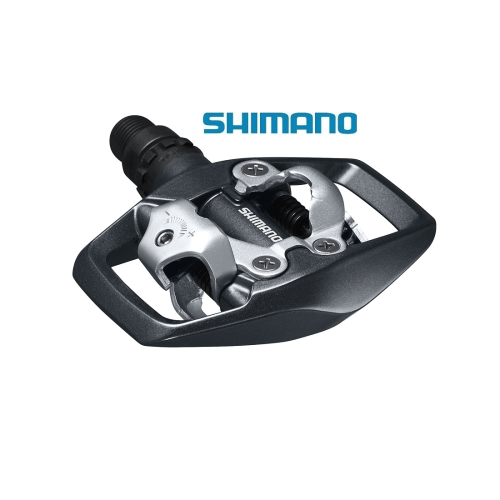 Detaljerad bild av en Shimano PD-ED500 SPD-pedal, presenterad i stark belysning som framhäver dess grå och silverfärgade yta och den exakta mekaniska designen.