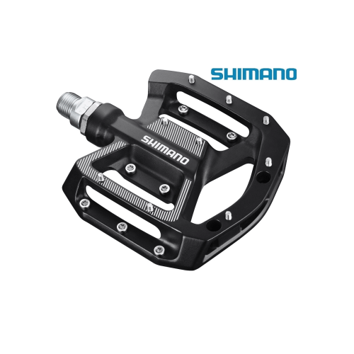 Cykelpedalen Shimano PD-GR500 plattform i svart, fotograferad mot en vit bakgrund. Pedalen har silverfärgade skruvar och en "SHIMANO" logotyp. Jämnt och studiolikt ljus.