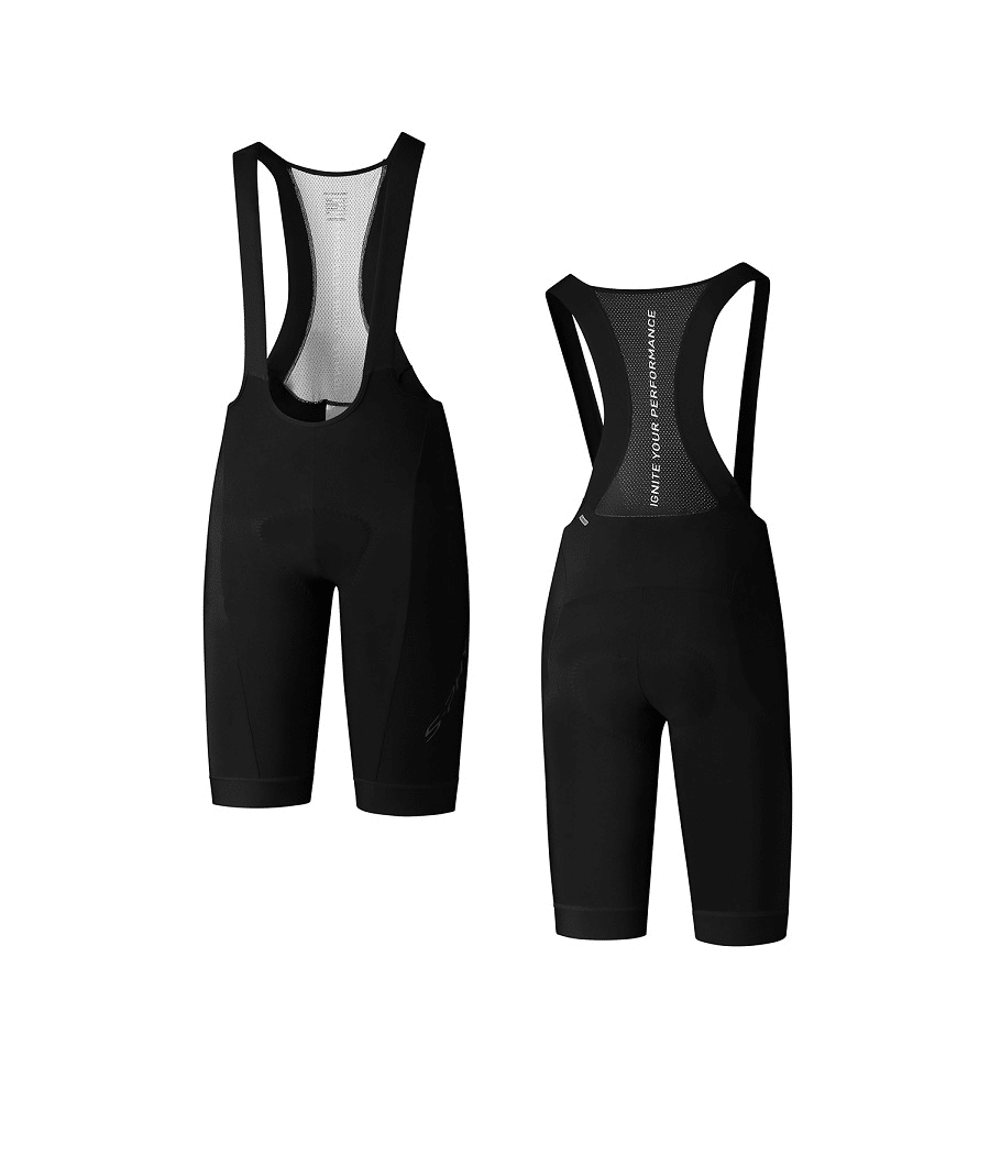 s-phyre-therminal-bibshort-1.png Fram- och bakifrån på Shimano S-Phyre Thermal Bib Short i svart med axelremmar. Dessa figursydda cykelbyxor visas på en vit bakgrund.