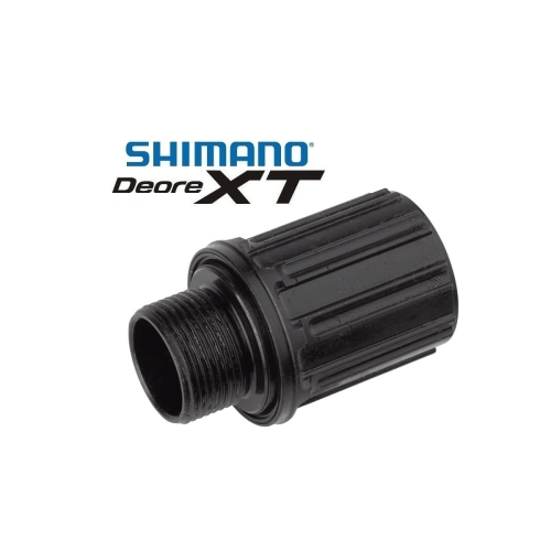 Detaljerad bild av en svart Shimano Deore XT/Saint FH-M820/788 frihjulsbody. Produkten är avbildad i ett studioljus, vilket framhäver detaljerna och den släta ytan.