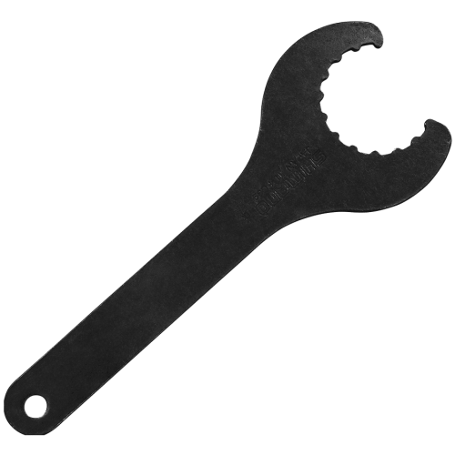 Verktyg Shimano TL-FC32 för vevlager, presenterat i svart mot en vit bakgrund. Kraftigt verktyg med ett cirkulärt, tandat grepp och ett långt handtag med ett hål i änden. Texten 'SHIMANO' syns.