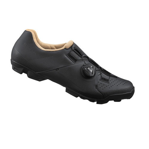 Shimano XC3 Dam MTB-skon i svart har ett brunt innerfoder