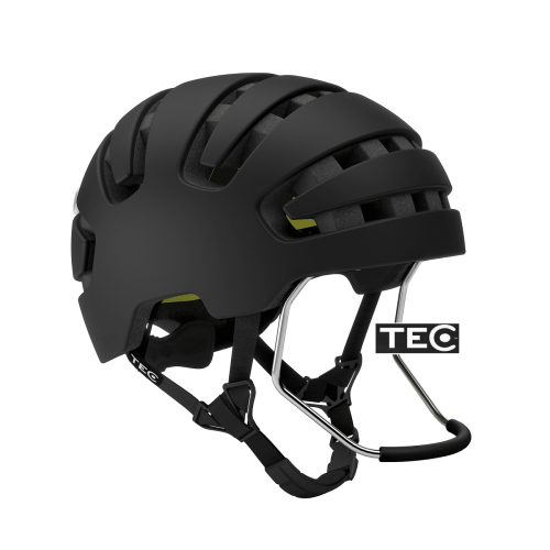 Hjälm Tec Boo Mips är en mattsvart cykelhjälm med ventilationsspringor, justerbar hakrem, "TEC"-logotypen på sidan och ett avtagbart ansiktsskydd i metall.