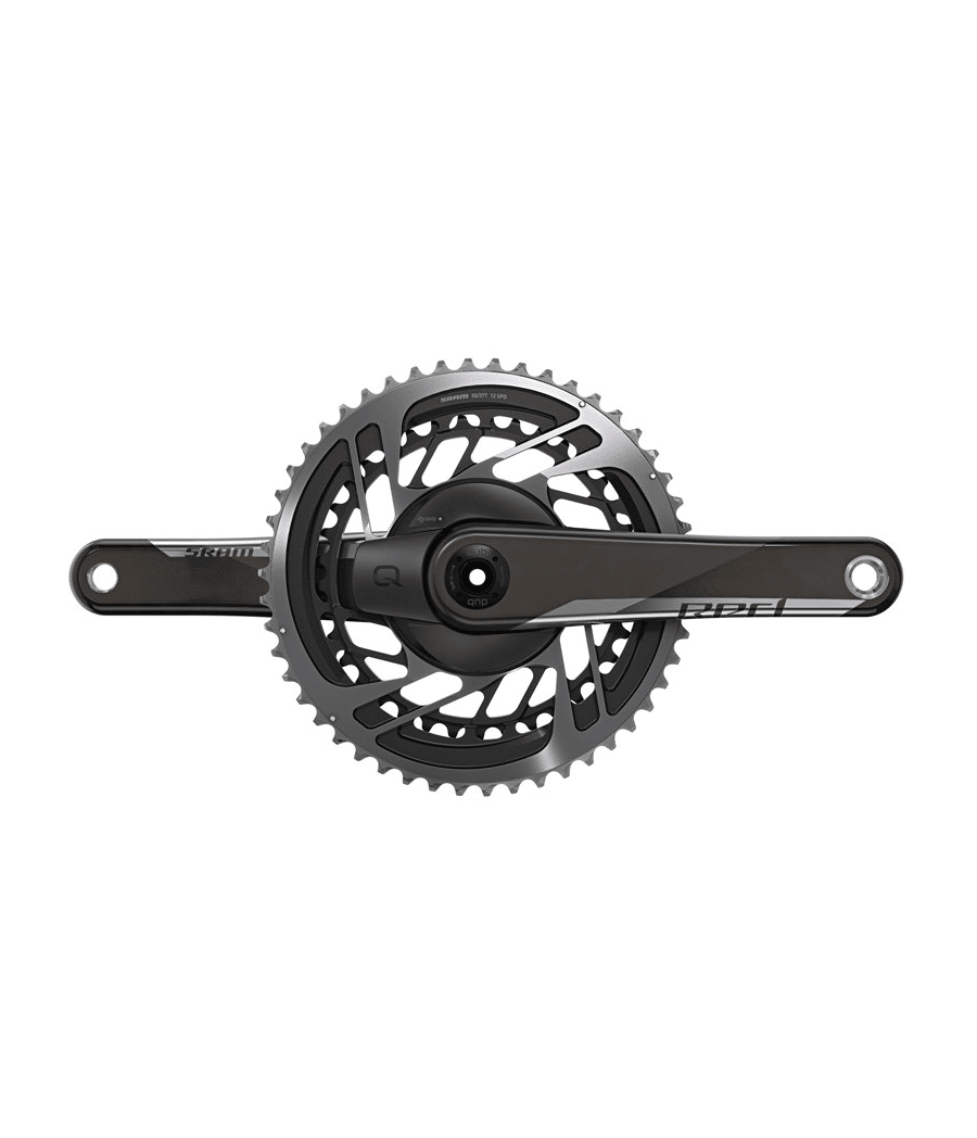vevparti-sram-red-axs-quarq-dub.png Vevparti Sram Red AXS Quarq DUB 50/37T, 2x12s i detalj. Stark belysning framhäver den moderna designen och kolfiberfinishen. Silverfärgade tänder kontrasterar mot den mörka bakgrunden.