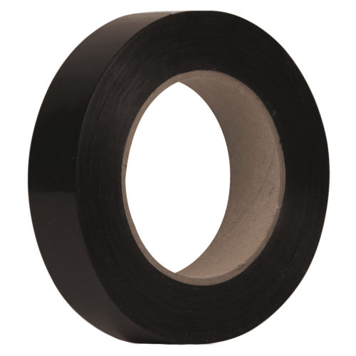 Detaljrik bild av en rulle Vittoria tubeless fälgtejp. Den svarta tejpen har en blank yta och sitter på en grå papprulle. Belysningen framhäver materialens texturer.