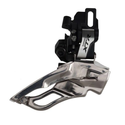 Framväxel Shimano XTR FD-M981 i silver och svart. Produktfotografering med stark belysning som framhäver detaljerna och den metalliska finishen. Avsedd för 3x10-växlade cyklar.