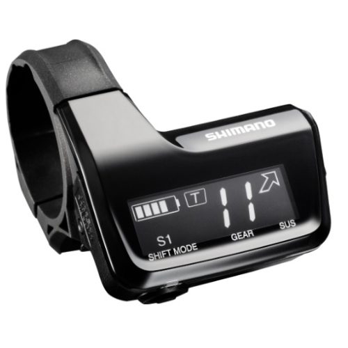 Närbild av en Shimano SC-MT800 Deore XT M8050 Di2-display. Den svarta displayen visar batterinivå, växel och läge. Starkt ljus framhäver detaljerna och den blanka ytan.