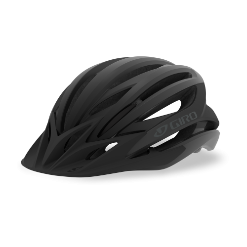 Svart cykelhjälm Giro Artex Mips i detalj, med subtila skuggor som framhäver designen. Ljuset lyfter fram hjälmens form och textur, vilket ger en taktil känsla.