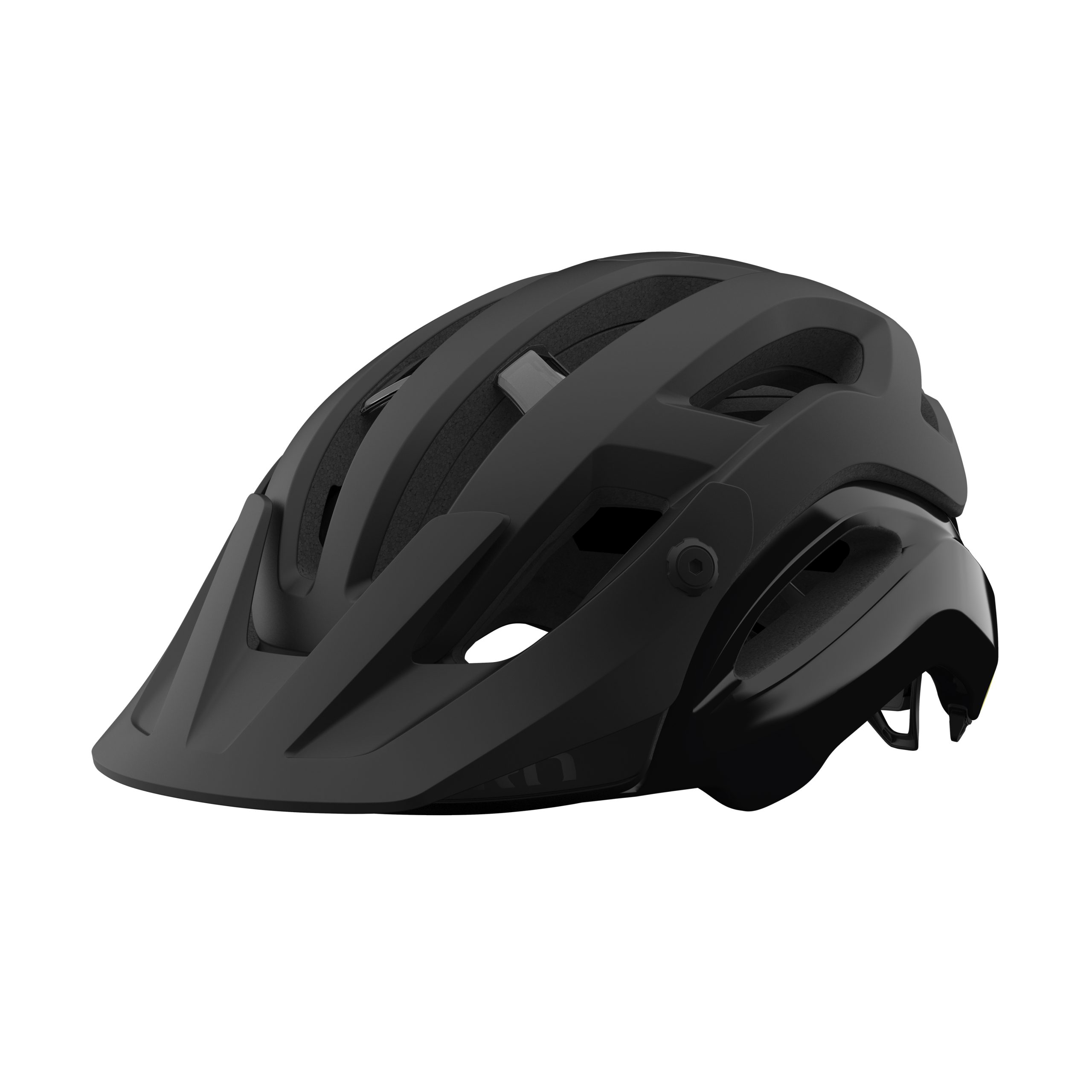 giro-manifest-spherical-dirt-helmet-matte-black-hero Svart Giro Manifest Spherical MIPS-hjälm mot en mörk bakgrund. Hjälmen har en matt finish, tydliga linjer och strategiskt placerade ventilationsöppningar, vilket framhävs av ljussättningen.