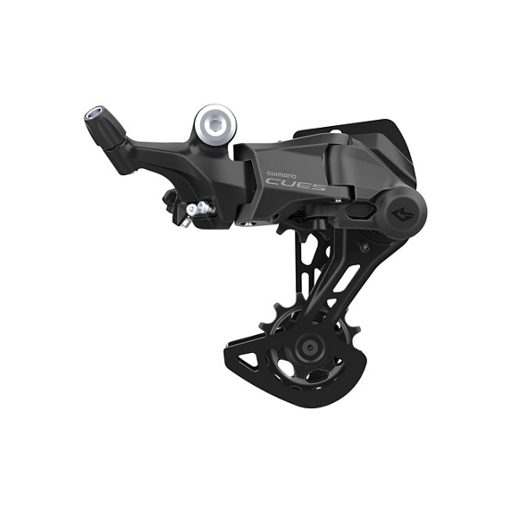 RD-U4000-shic219-primary_1.jpg.thumb.572.572 En detaljerad bild av en svart Shimano CUES RD-U4000 bakväxel, 1x9s. Starkt ljus framhäver de komplexa mekaniska detaljerna och den matta finishen.