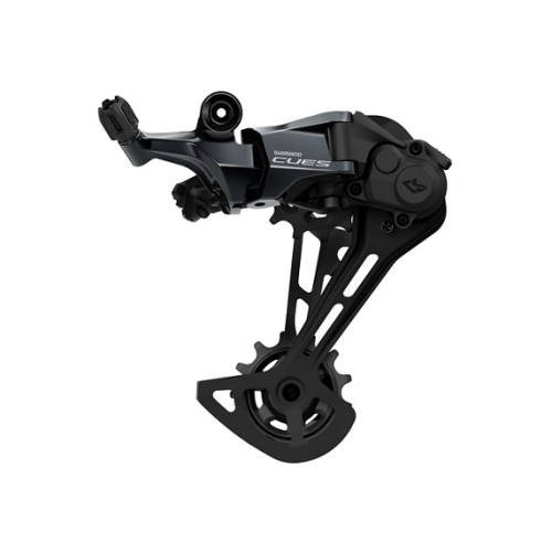 Detaljerad bild av en svart Shimano CUES RD-U8000 bakväxel för 1x11 växlar. Kraftig belysning framhäver växlingsmekanismen och dess konstruktion.