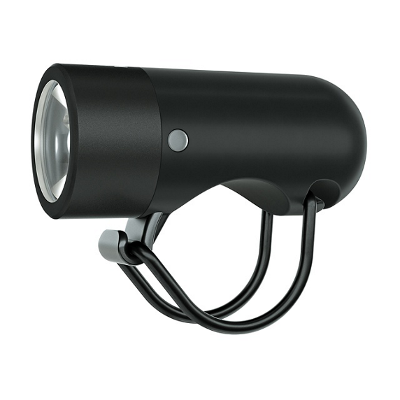 Knog-Plug Närbild av en svart Knog Plug 250 lumen framlampa för cykel, monterad med ett flexibelt fäste. Lampan har en silverfärgad reflektor och en diskret grå strömbrytare.