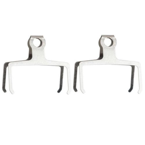 Närbild av två Avid/Sram Elixir fjädrar för bromsbelägg, presenterade på en vit bakgrund. Metalliska och skira, fångade i neutral belysning. Avsedda för att stabilisera bromsbeläggen.