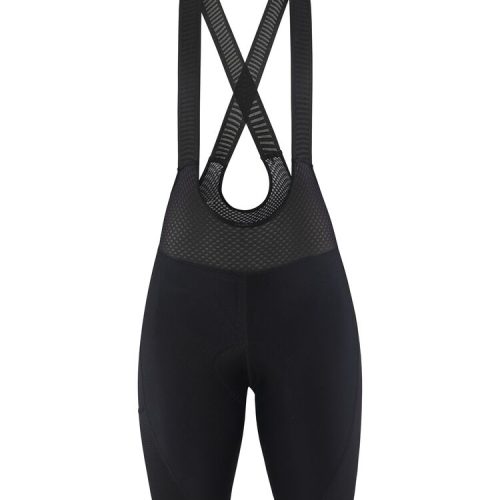 Svarta Craft ADV Gravel Bib Shorts för damer på vit bakgrund.