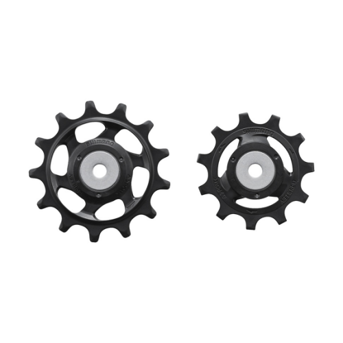 Två svarta Shimano rulltrissor för GRX RD-810, tydligt belysta på en vit bakgrund. Detaljerna, inklusive "SHIMANO" och "G-PULLEY", är klart synliga på trissorna.