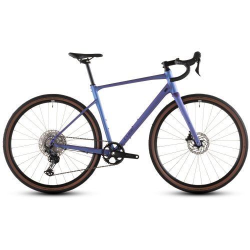 Gravel Cube Nuroad EX, 1x12s - Vit (kopia) visas i sidoprofil med droppstyre, skivbromsar och brunrandiga däck mot en vit bakgrund.