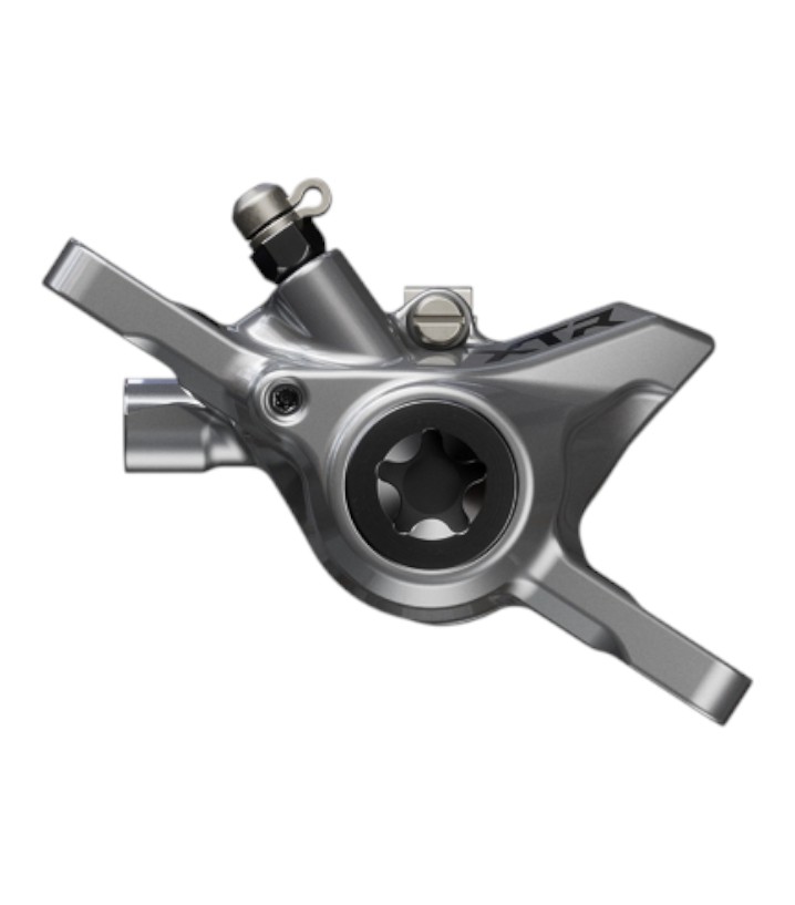 BR-M9200-shic219-primary_1.jpg.thumb.572.572 En närbild av Skivbromsok Shimano XTR BR-M9200 Fram/Bak-bromsoket, som visar metallfinishen, det centrala monteringshålet, de två utskjutande armarna och "XTR"-märkningen.