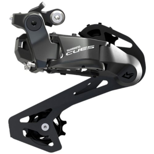 En närbild av Bakväxel Shimano Cues Di2 RD-U6070, 11s bakväxel visar dess metallkropp, jockeyhjul och monteringsdetaljer mot en vit bakgrund.