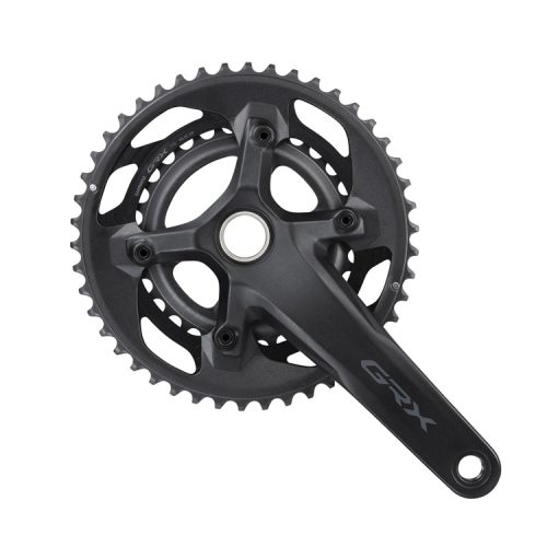Ett svart Shimano GRX FC-RX600-2 46/30T, 2x11s vevparti för gruscyklar, med två kedjehjul och "GRX"-märkt vevarm med pedalhål. Fotot är taget uppifrån mot en vit bakgrund.