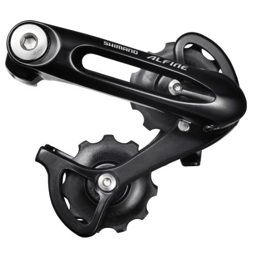 En svart Shimano Alfine CT-S500 kedjestäckare med två synliga jockeyhjul, metallbultar och märkesarm visas mot en vit bakgrund. Utformad för ramar där kedjespänning inte är möjlig.