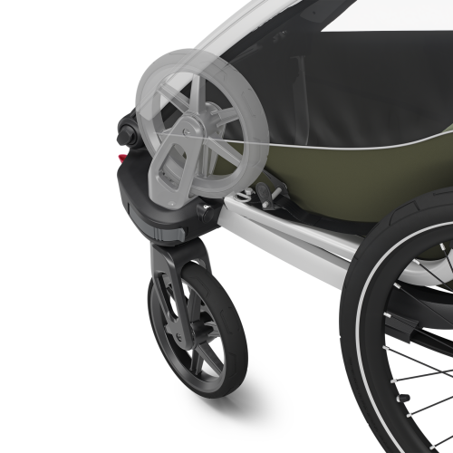 Närbild av Thule Chariot Lite Cykelvagn - Enkel & Dubbel i vintagegrönt, med framhjulsfästet, en del av ramen och det ekrade hjulet markerade mot en vit bakgrund.